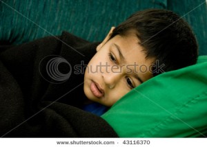 stock-photo-an-handsome-indian-kid-very-sick-43116370